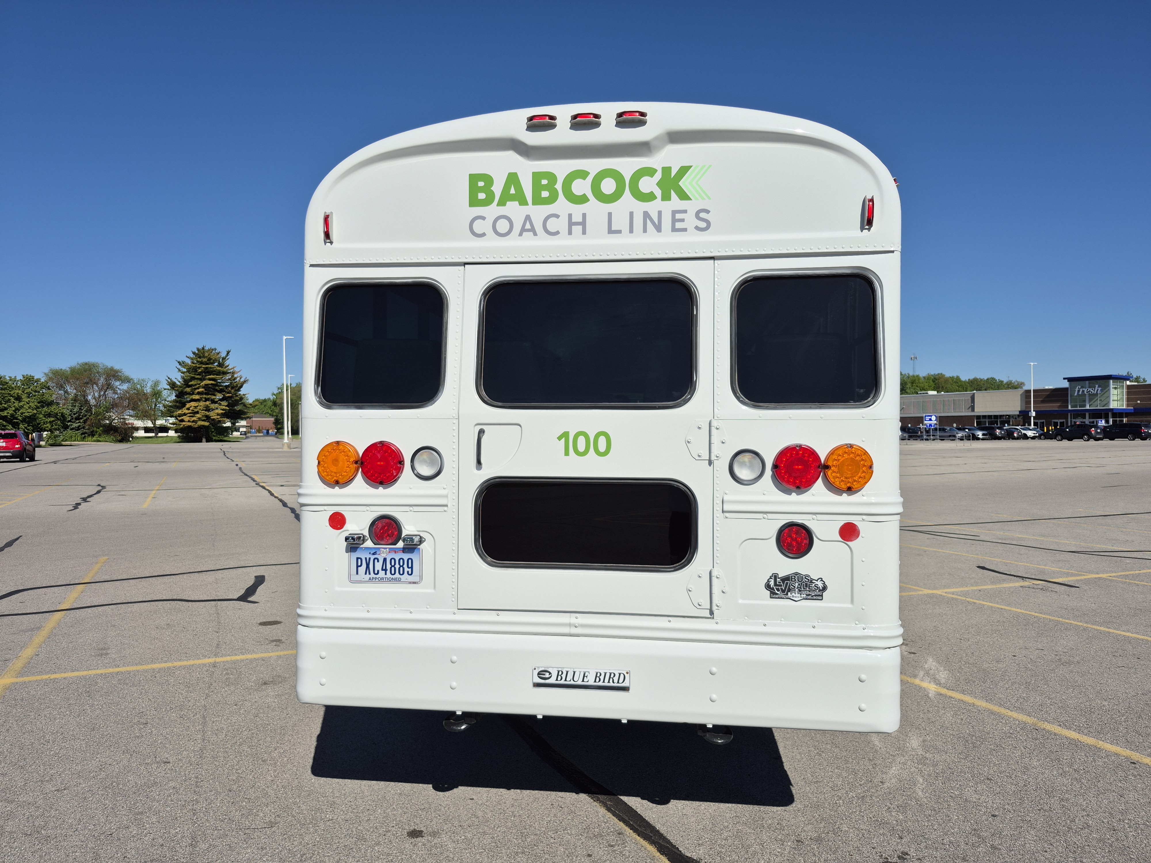 Rear view of Babcock Coach Lines bus