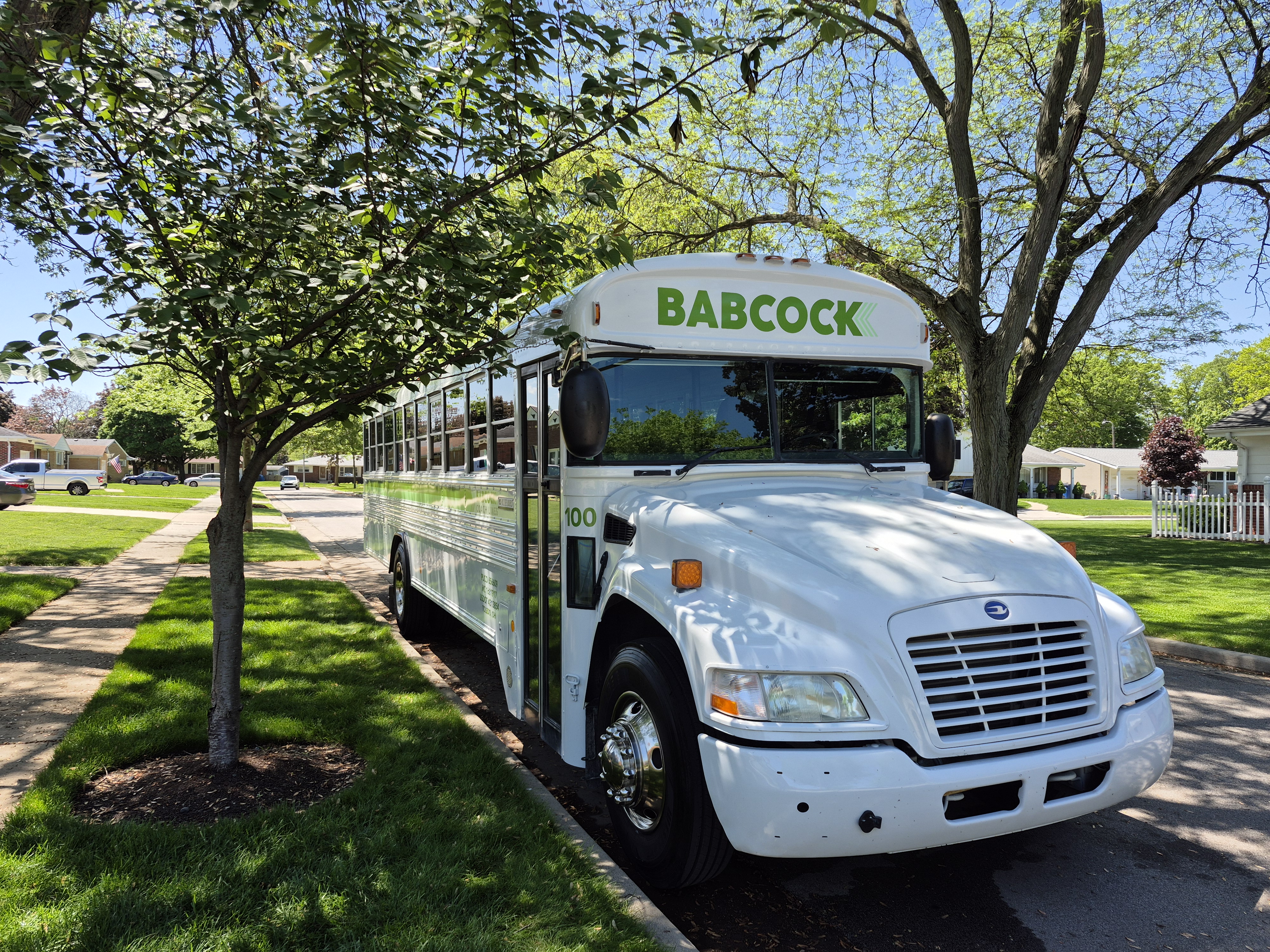 Bus parked in yard front view