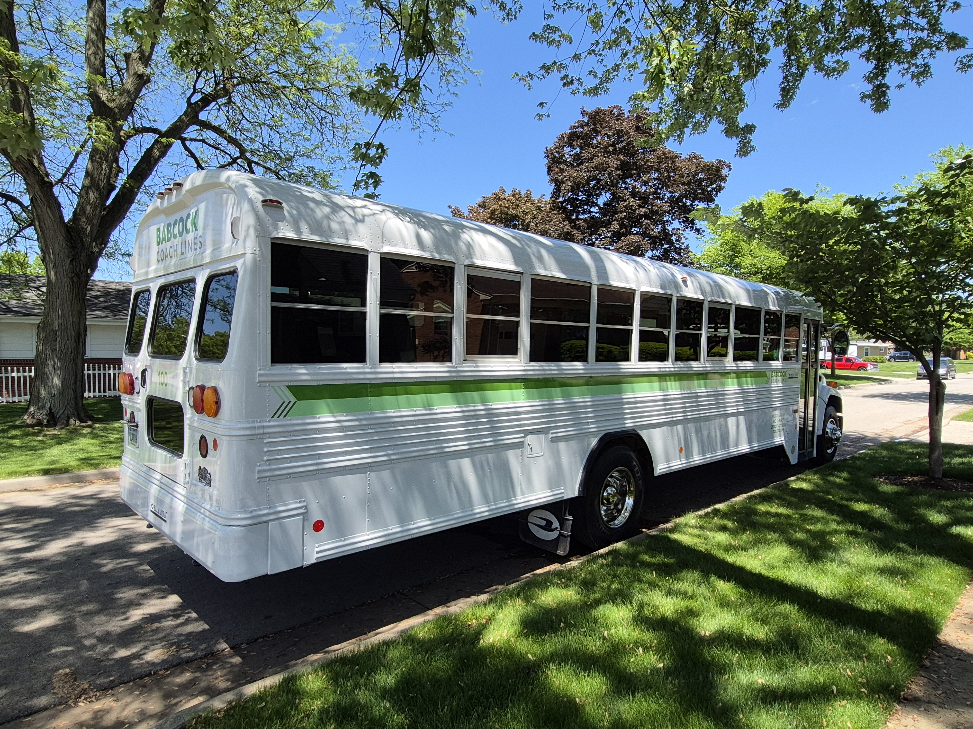 Bus parked in yard side view