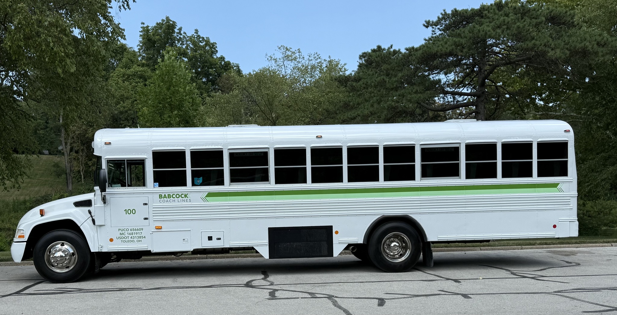 Image of the side of a Babcock Coach Lines bus